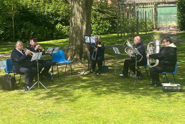 A brass ensemble entertains the crowds at RL Hughes Primary, Ashton