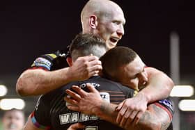 Wigan came from behind to claim a 22-12 victory over Salford