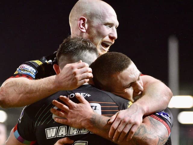 Wigan came from behind to claim a 22-12 victory over Salford