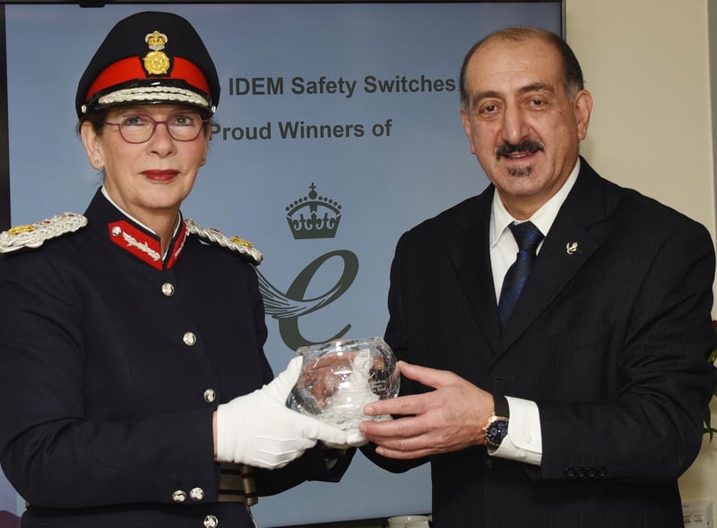from left, Greater Manchester Lord Lieutenant Diane Hawkins, representing his majesty the King, presents the award to Idem managing director Medi Mohtasham.