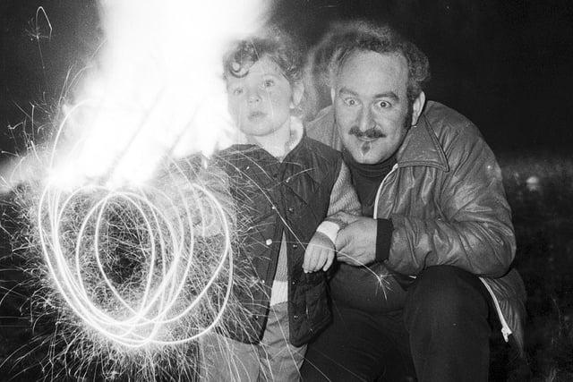 Father and son enjoy the sparklers in Lessingham Avenue, Whitley, in 1982