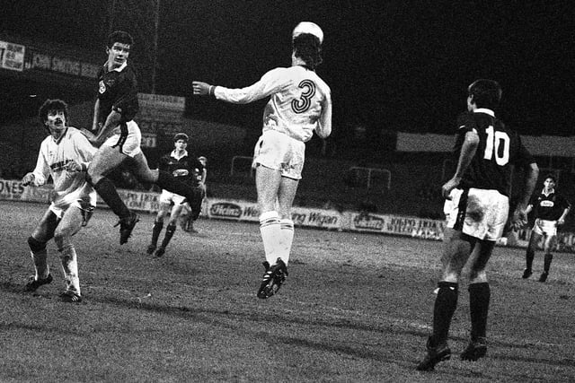 Alan Johnson with a header for Wigan Athletic against Moscow Torpedo during a friendly match at Springfield Park on Wednesday 21st of February 1990.
The result was a 0-0 draw.