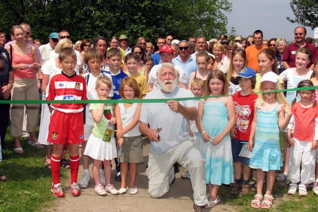 Famous botanist David Bellamy cuts the tape to launch the Greenslate wet meadows local nature reserve at Orrell Water Park in 2007