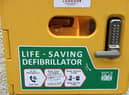One of the defibs installed at eight pubs in Wigan