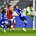 Tom Watson clears his lines as Nottingham Forest Under-21s threaten