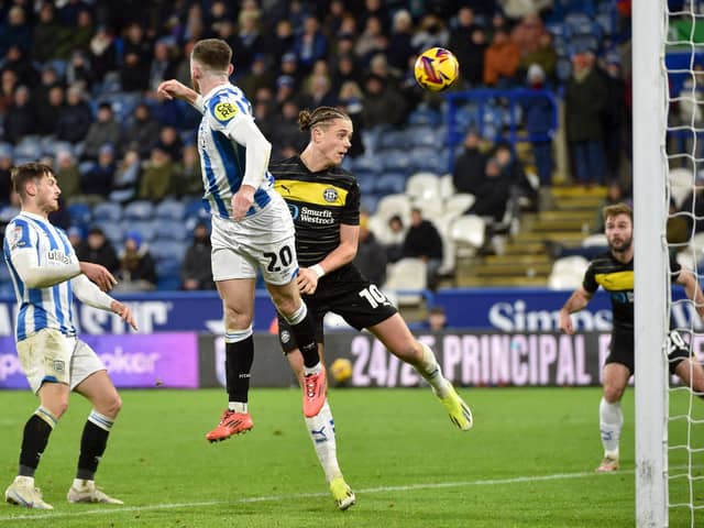 Thelo Aasgaard has a sight of goal for Wigan in the defeat at Huddersfield Town