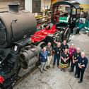 Steve Everett, finance director, Ian Crowder, marketing director, Simon Edmunds, website and social media manager, Chris Irving, chairman, Dawn Southwell, share registrar, Rob Southwell, volunteer, and Rob Merrick, team secretary, with the locomotive