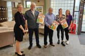 Coun Chris Ready and Peter John Fox deliver cornflakes to Wigan and Leigh Hospice