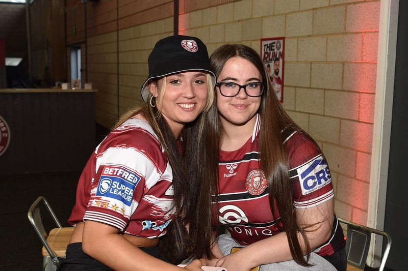 Wigan Warriors fans at the Robin Park Arena fan zone.