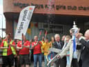 Life President Dave Whelan, right, with the FA Cup as founder chairman Martin Ainscough cut the ribbon to mark the official opening of Wigan Youth Zone.