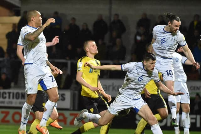 Will Keane heads for goal