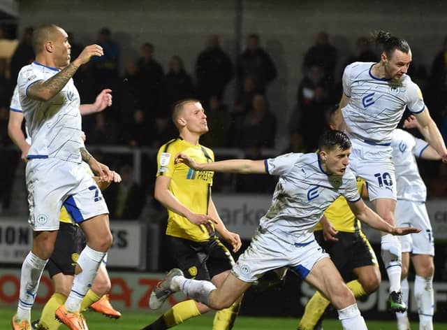 Will Keane heads for goal