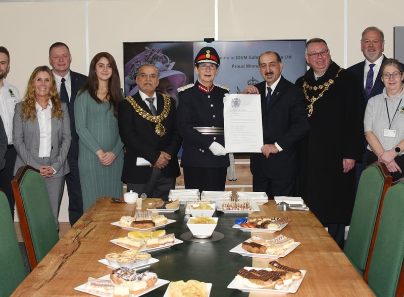Staff and invited guests at the presentation.
