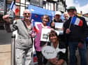 The entente cordiale between Wigan and Angers has been fostered for decades now. Here are volunteers flying the French flag at last year's Rotary Club community day in Wigan town centre