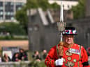 A Yeomen Warders stands guard for the Death Gun Salute fired at the Tower of London by the Honourable Artillery Company, British Army, taking place to mark the death of Queen Elizabeth II.