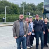 Councillors with Mayor of Greater Manchester Andy Burnham and Labour's parliamentary candidate for Leigh Jo Platt with a V2 bus