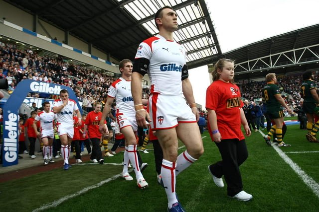 Kevin Sinfield leads out England for their first game at the DW Stadium back in 2009.