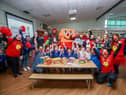 Amazon staff with pupils at Meadowbank Primary School's breakfast club