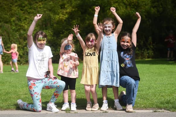 Children having fun at last year's Playday at Haigh Woodland Park