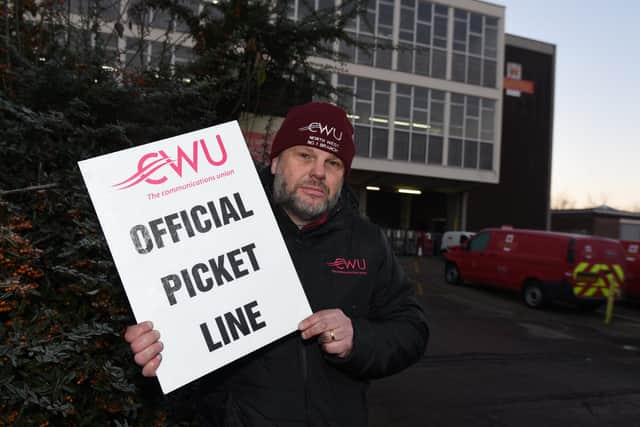 Gary Ingram, CWU branch secretary, at the official picket line outside Royal Mail's office on Hallgate, Wigan