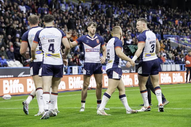 England celebrate Matty Ashton's try against Tonga