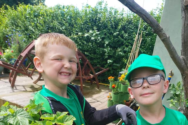 Youngsters from Hindley Green Junior Volunteers at work on the allotment