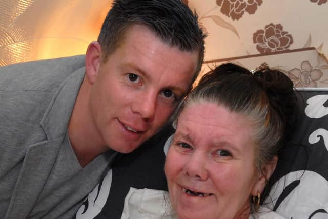 Dean Percival with his mum Irene in 2012. He more recently used her maiden name Prescott