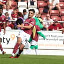Josh Magennis has proved to be a shrewd signing for Exeter since leaving Latics over the summer