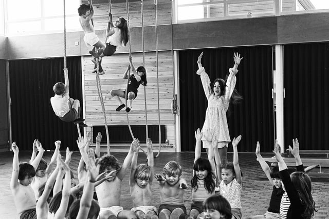 Miss Barbara Batho leads a gym class at St. Bernadettes RC Primary School, Shevington, in July 1972.