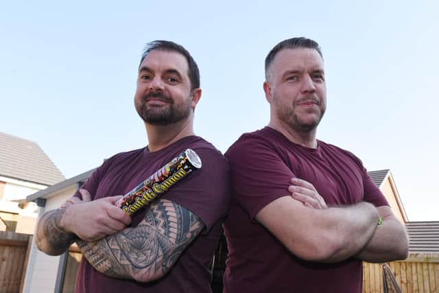 Neighbours Adrian Heaton, left, and Gareth Jones, from Standish,  have been playing pranks on each other, their latest, where Adrian let off a confetti cannon in Gareth's garden just after he'd finished cleaning up, has gone viral on Tiktok, with three million views.