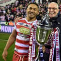 Willie Isa and Wigan chairman professor Chris Brookes with the World Club Challenge trophy