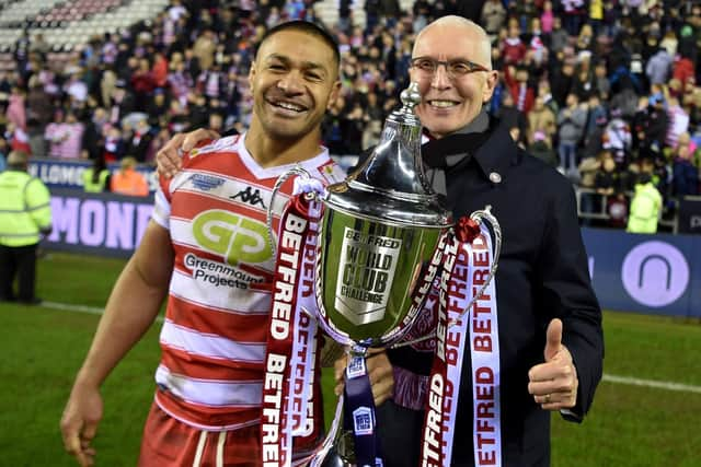 Willie Isa and Wigan chairman professor Chris Brookes with the World Club Challenge trophy