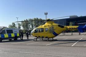 The air ambulance and police on the car park at Tesco Extra in Leigh