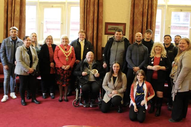 A moving ceremony was held at Wigan Town Hall to present Dave Grundy with the award