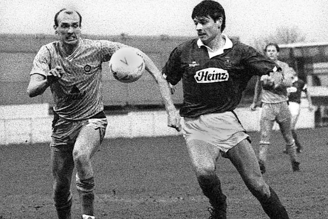 Former Wigan Athletic favourite Colin Methven challenges Latics striker Phil Daley for the ball in a Division 3 match against Blackpool at Springfield Park on Saturday 20th of January 1990.  The match ended in a 1-1 draw with Andy Pilling getting Latic's goal.