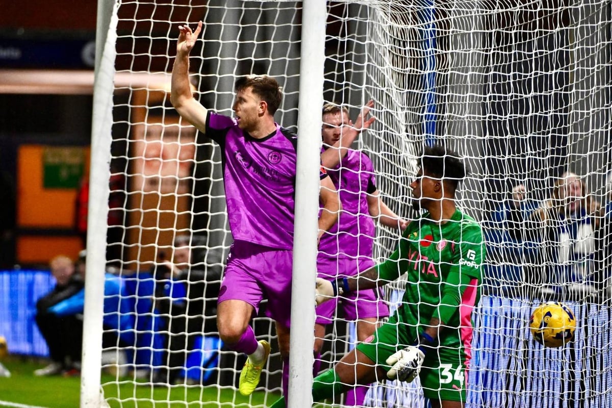 Wigan Athletic chief reacts to 'crazy' night in the rain at Stockport County