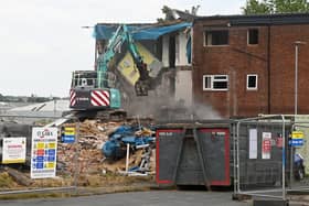 Flats being demolished on Logwood Place last year