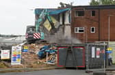 Flats being demolished on Logwood Place last year