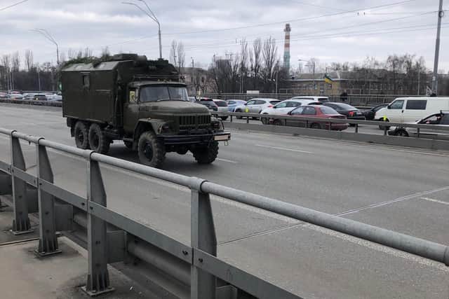 Nick Taylor saw military vehicles as he fled Kyiv