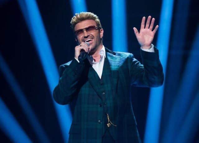 Rob Lamberti as George Michael
