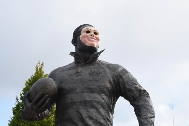 The masked Boston statue