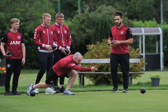 WIGAN - 14-09-22 Wigan Warriors players joined youth players and teamed up with senior bowlers at Bellingham Bowling Club, Wigan, part of the Walkathon challenge 14 countries in 14 days, visiting a Crown Green Bowling Club in each county, to raise funds and awareness of Motor Neuron Disease.
