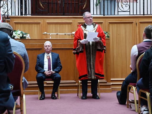 Greater Manchester Deputy Lieutenant Martin Ainscough and Mayor of Wigan Coun Kevin Anderson welcomes Wigan's new British Citizens as certificates were presented at the  monthly British Citizenship ceremony held at Wigan Town Hall.