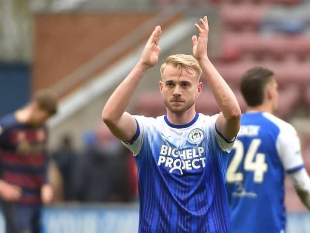 Jack Whatmough salutes the Latics fans after Saturday's 1-0 victory over QPR