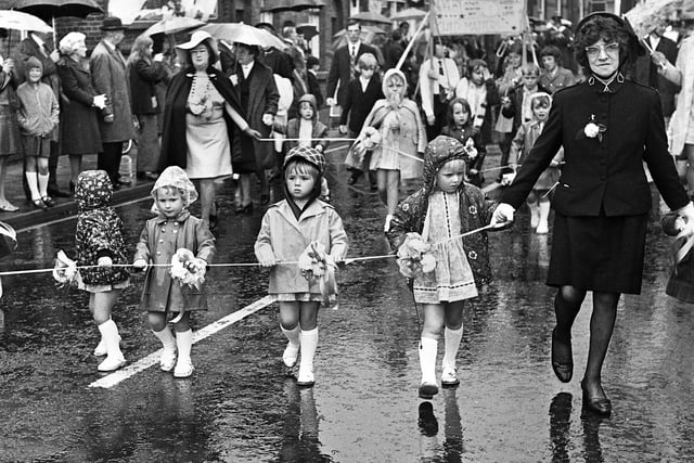 The Standish combined churches walk under way through the pouring rain on Sunday 24th of June 1973.