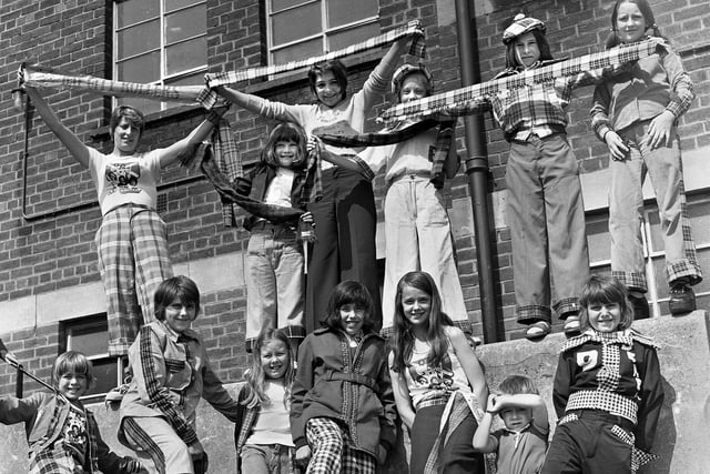 Scottish pop group the Bay City Rollers were all the rage in 1975 and here Wigan fans of the lads don the tartan at a fancy dress competition at the ABC Minors on Saturday 7th of June that year.