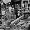 Frank Tickle on his last day in his shop in the Wiend on Monday 3rd of December 1979 before moving to the Times Craft Centre on Mesnes Street.
