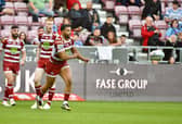 Kruise Leeming has been included in Wigan's 21-man squad for Friday's clash against Warrington Wolves