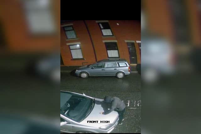 CCTV image apparently showing one of the cars being damaged in Scholes