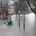 Flooding turned the street into a river on New Year's Day. Picture by David Hurst.